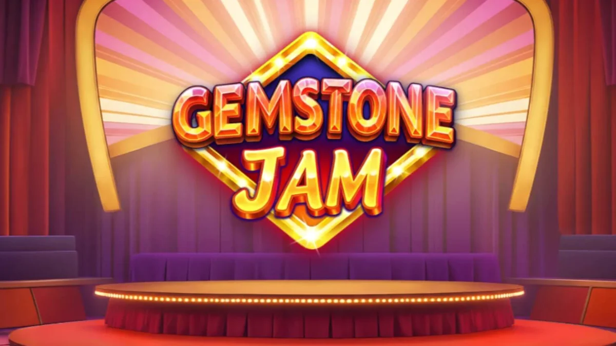 Tangkapan layar permainan slot Gemstone Jam oleh Yggdrasil dengan gulungan 3x3 yang berkilau, simbol permata, dan latar belakang panggung game show yang glamor.
